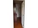 Walk-in closet with wood floors and shelving at 2938 Egrets Landing Dr, Lake Mary, FL 32746