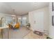 Bright dining area with round table and yellow chairs at 644 Hudson Valley Dr, Kissimmee, FL 34759