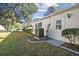 View of backyard, AC unit and small shed at 14544 Sw 112Th Cir, Dunnellon, FL 34432