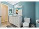 Bathroom with white vanity and toilet at 14544 Sw 112Th Cir, Dunnellon, FL 34432