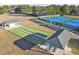 Two bocce ball courts with pavilions near tennis courts at 14544 Sw 112Th Cir, Dunnellon, FL 34432