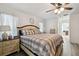 Spacious main bedroom with king-size bed and ensuite bathroom access at 14544 Sw 112Th Cir, Dunnellon, FL 34432