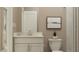 Clean bathroom with a vanity, toilet and shower at 1943 Rider Rain Ln, Apopka, FL 32703