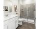 Clean bathroom with a walk-in shower and vanity at 274 Puma Loop, Groveland, FL 34736