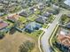 Aerial view of a single Gathering home in a residential neighborhood at 4545 Mandolin Blvd, Winter Haven, FL 33884