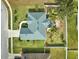 Bird's-eye view of a single-story house, yard, and driveway at 4545 Mandolin Blvd, Winter Haven, FL 33884