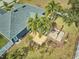 Aerial view of a home with a spacious backyard, including a pergola and deck at 4545 Mandolin Blvd, Winter Haven, FL 33884