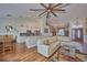 Open concept kitchen with white cabinets, granite countertops, and stainless steel appliances at 4545 Mandolin Blvd, Winter Haven, FL 33884