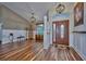 Spacious living room with hardwood floors and elegant light fixtures at 4545 Mandolin Blvd, Winter Haven, FL 33884