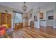 Bright living room with hardwood floors, vaulted ceiling, and comfortable seating at 4545 Mandolin Blvd, Winter Haven, FL 33884