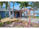 Relaxing patio area with pergola and pavers at 4545 Mandolin Blvd, Winter Haven, FL 33884