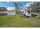 Backyard view showing a shed and additional space at 4844 Creek Meadow Trl, Lakeland, FL 33810