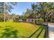 Single story home with landscaped yard and fenced area at 6104 Irby W Ln, Lakeland, FL 33811