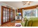 Sunroom features French doors opening to the backyard at 6104 Irby W Ln, Lakeland, FL 33811