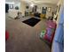 Spacious bonus room with carpeted floor at 1054 N Platte Way, Kissimmee, FL 34759