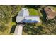 Aerial view of a single Gathering house, large lot, pool and metal roof at 1507 Hontoon Rd, Deland, FL 32720