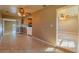 Bright dining area with tile floors and access to the kitchen at 1507 Hontoon Rd, Deland, FL 32720