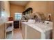 Laundry room with washer, dryer and shelving at 1507 Hontoon Rd, Deland, FL 32720