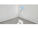 Cozy bedroom with plush carpeting and a window providing natural light at 1254 Lakeridge Way, Lake Alfred, FL 33850