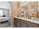 Double vanity bathroom with a view of bedroom at 1734 Hill Top Dr, Dundee, FL 33838