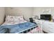 Bedroom with a twin bed, dresser, and TV at 1734 Hill Top Dr, Dundee, FL 33838