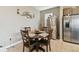 Kitchen dining area with round table and four chairs at 1734 Hill Top Dr, Dundee, FL 33838