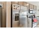 Modern kitchen features stainless steel appliances and ample cabinetry at 1734 Hill Top Dr, Dundee, FL 33838