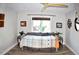 Cozy bedroom featuring a daybed and ample natural light at 225 Temple Cir, Eustis, FL 32726