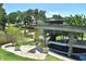Waterfront property featuring a private boat lift, perfect for boating enthusiasts at 225 Temple Cir, Eustis, FL 32726