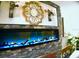 Modern linear fireplace with stone surround and mantle at 225 Temple Cir, Eustis, FL 32726