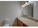 Bathroom with granite countertop and large mirror at 2888 Bella Vista Dr, Davenport, FL 33897