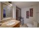 Bathroom with granite countertop and shower at 2888 Bella Vista Dr, Davenport, FL 33897