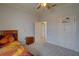 Bright bedroom with double doors and ceiling fan at 2888 Bella Vista Dr, Davenport, FL 33897