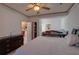 Bright bedroom with a king-size bed and en-suite bathroom at 2888 Bella Vista Dr, Davenport, FL 33897