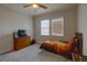 Cozy bedroom with carpeted floor and built-in dresser at 2888 Bella Vista Dr, Davenport, FL 33897