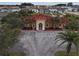 Community clubhouse with tile roof and ample parking at 2888 Bella Vista Dr, Davenport, FL 33897