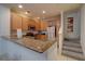 Modern kitchen with granite countertops and stainless steel appliances at 2888 Bella Vista Dr, Davenport, FL 33897
