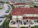 Townhouse with red tile roof and private patio at 2888 Bella Vista Dr, Davenport, FL 33897