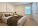 Bright bedroom with a queen-size bed and neutral color scheme at 30364 Armenia Rd, Leesburg, FL 34748