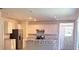 Kitchen with island and ample cabinet space at 30364 Armenia Rd, Leesburg, FL 34748