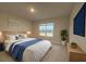 Spacious main bedroom with plush bedding and a large window at 30364 Armenia Rd, Leesburg, FL 34748