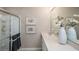 Modern bathroom with a walk-in shower and elegant vanity at 1951 Rosewood Cir, Lakeland, FL 33810