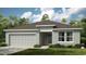 One-story home with a two-car garage and landscaped front yard at 1951 Rosewood Cir, Lakeland, FL 33810