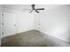 Bedroom with door and modern ceiling fan at 2449 Jungle St, Lakeland, FL 33801