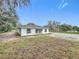 Charming single story home with a new roof, neutral paint and an expansive front lawn at 2449 Jungle St, Lakeland, FL 33801