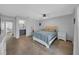 Spacious bedroom with a large bed and en-suite bathroom at 260 Winter Ridge Blvd # 38, Winter Haven, FL 33881