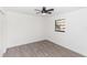 Simple bedroom with hardwood floors and a window at 817 Helen Ave, Deland, FL 32720