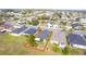 Aerial view of a house with a screened patio and backyard at 3782 Hampton Hills Dr, Lakeland, FL 33810