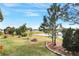 Spacious backyard with fire pit, overlooking a lake at 3782 Hampton Hills Dr, Lakeland, FL 33810