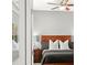 Bright bedroom with ceiling fan and wood furniture at 1066 Krenson Woods Rd, Lakeland, FL 33813